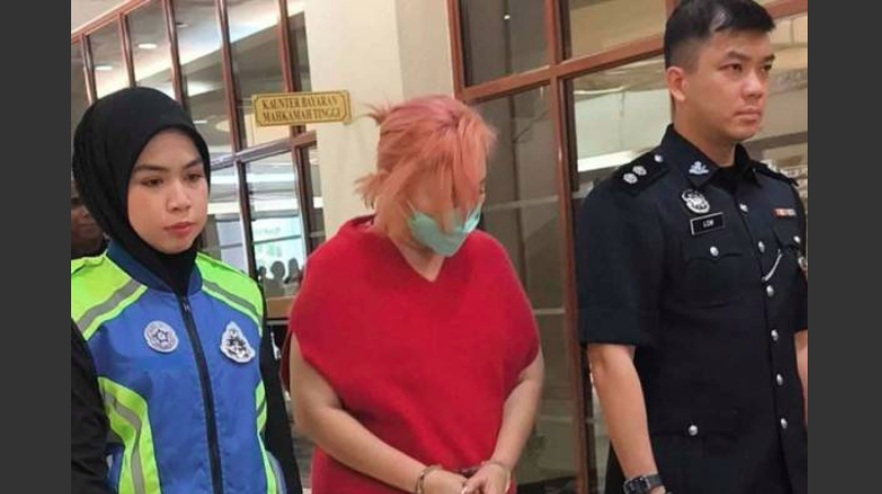 Sum Lai Yoong, 53, dibawa ke Mahkamah Sesyen Kuala Lumpur hari ini. - Gambar/ Sinar Harian