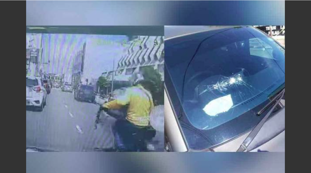 Suspek dipercayai melakukan khianat dengan mengayun rantai besi ke cermin hadapan sebuah kereta. - Gambar/ Media sosial